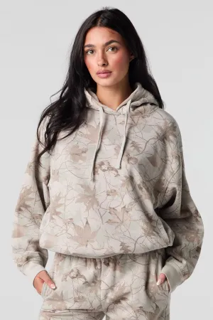Haut à capuchon en molleton avec motif camouflage