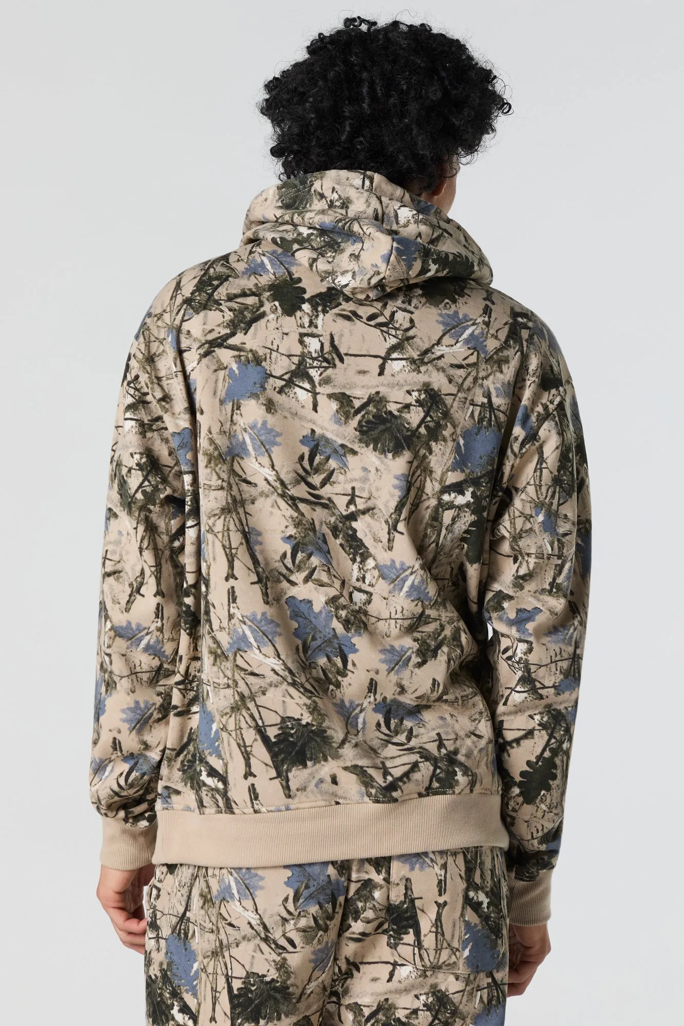 Haut à capuchon en molleton à imprimé camouflage