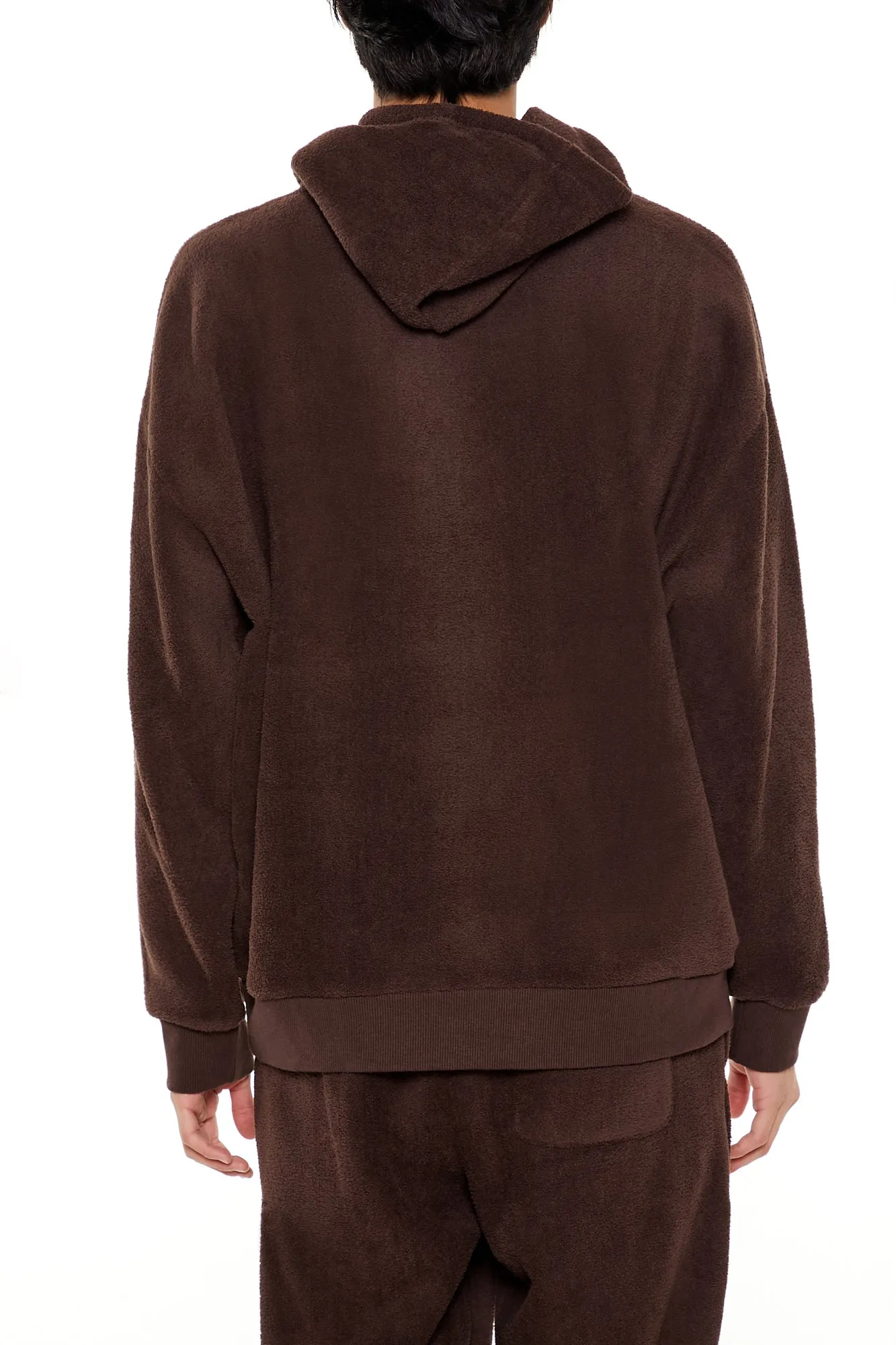 Haut à capuchon en tricot pelucheux